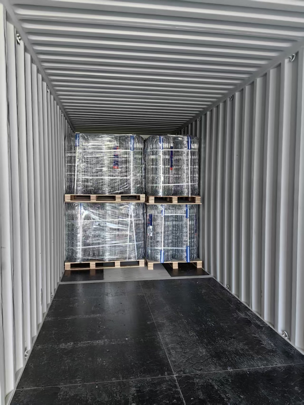 Palletised rolls of YIELD MAX 7/90/30 fixed knot fence loaded inside an export container for Australia